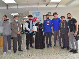 GR-12-Boys giving donation at Sharjah City for HumanitarianServices